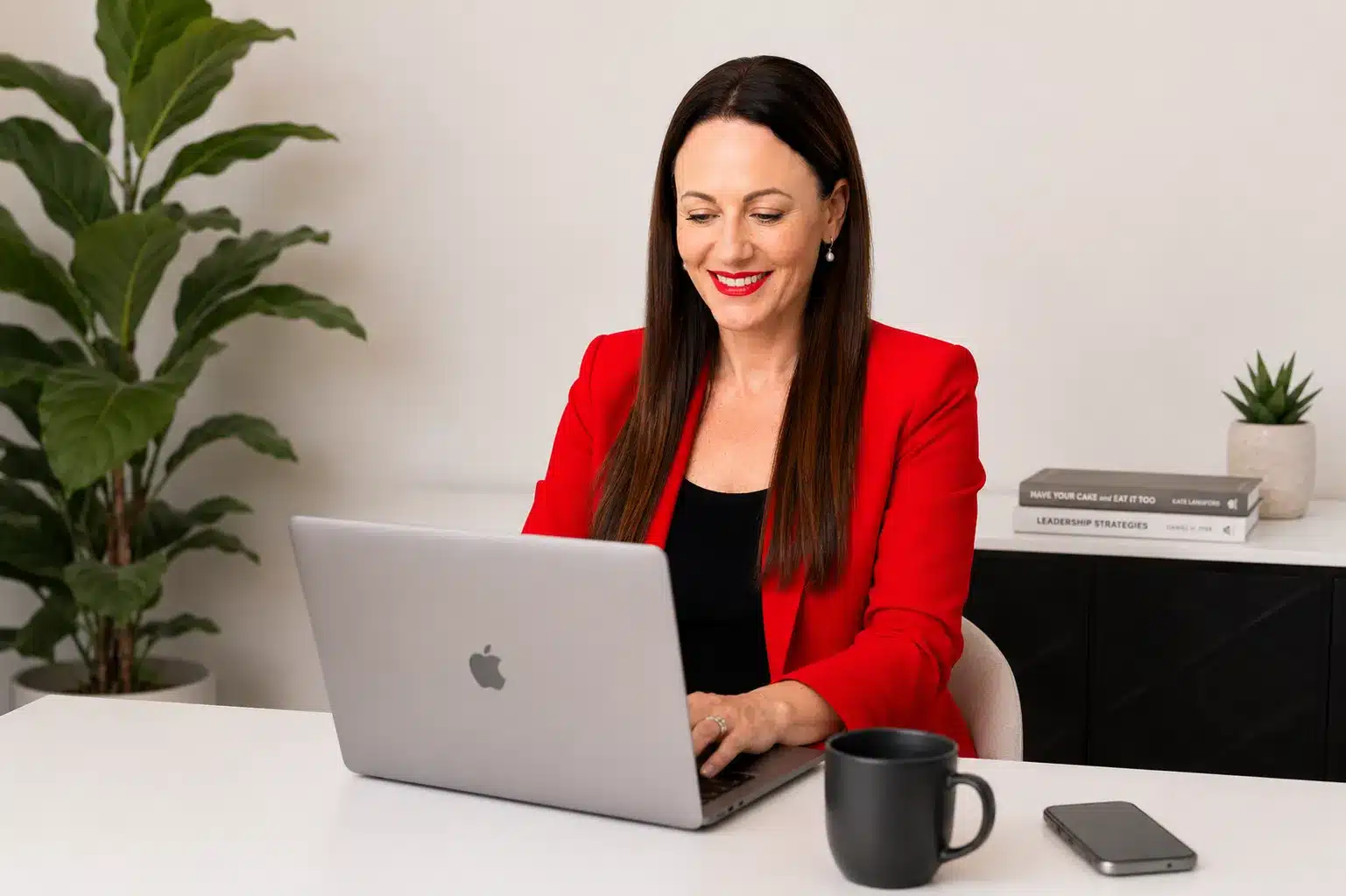 Kate at computer working growth strategy coaching australia